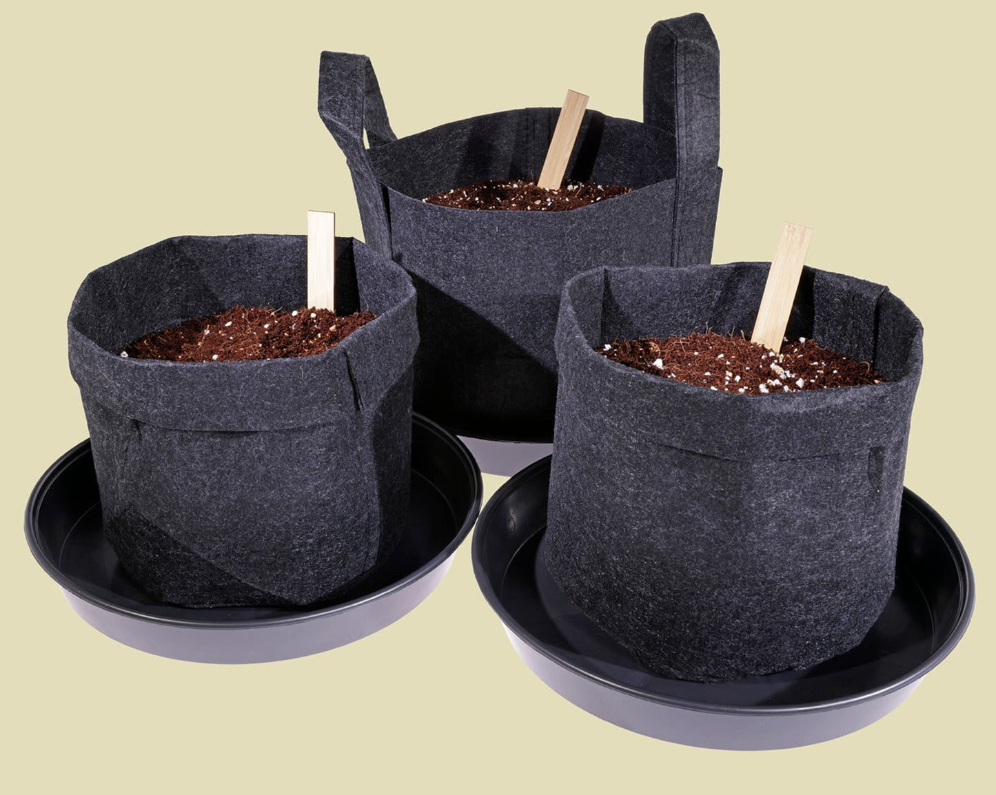 Eco friendly fabric grow pots, a biodegradable alternative to traditional plastic pots. And our recycled plastic saucers.