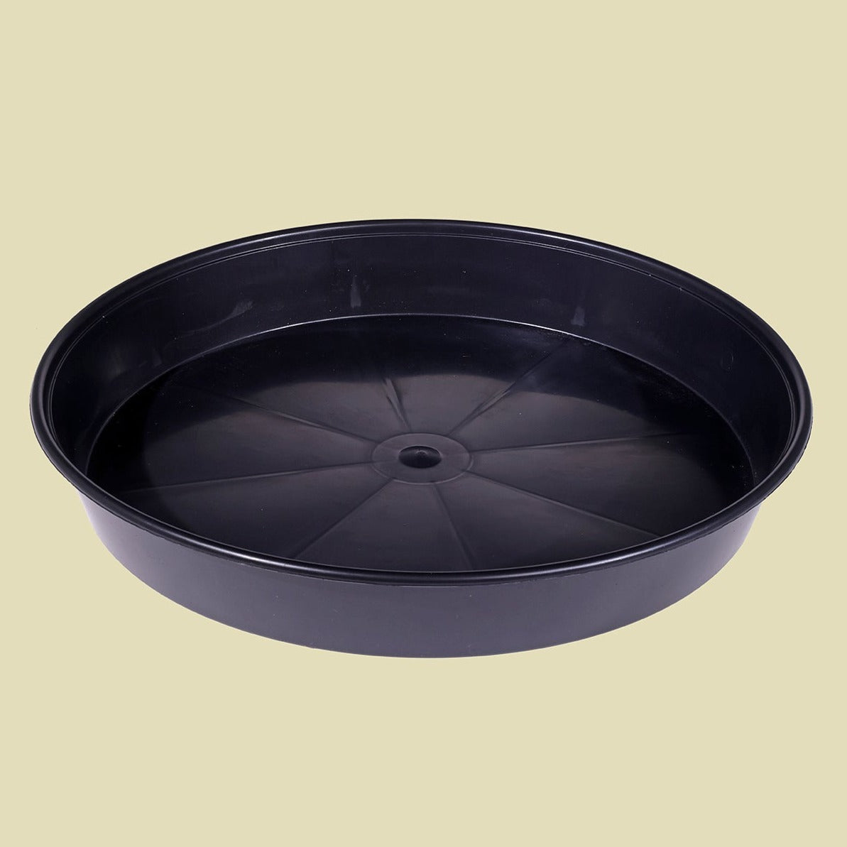 Our recycled plastic saucers catch excess water, keeping your growing space free from mess.